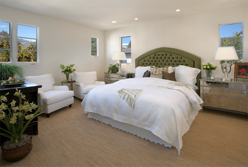 Bedroom with green headboard