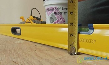 Laminate floor leveling