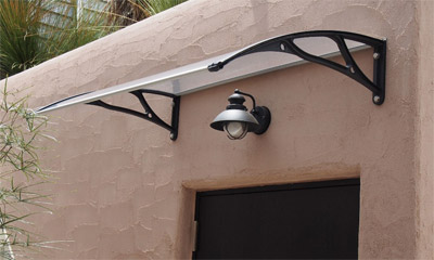 Visor above polycarbonate entrance doors