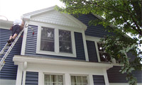 The house is sheathed with vinyl siding